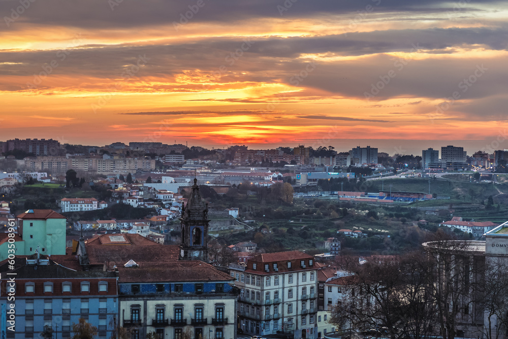 Sunset over Porto city, Portugal. View from bell tower of Clerigos Church