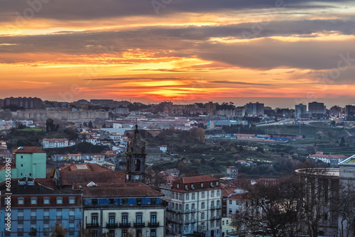 Sunset over Porto city, Portugal. View from bell tower of Clerigos Church