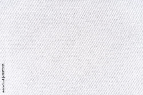 Texture of natural fabric or cloth. Fabric texture diagonal weave of natural cotton or linen textile material. White canvas background. Decorative fabric for curtain, furniture, walls, clothes