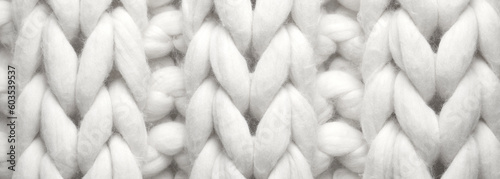 White knitted fabric as background, top view. Banner design © New Africa