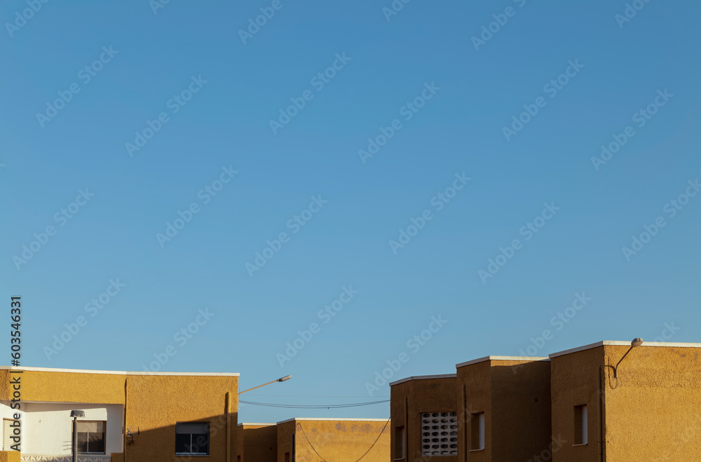Residential buildings against blue sky. Almeria, Spain Residential buildings against blue sky. Almeria, Spain