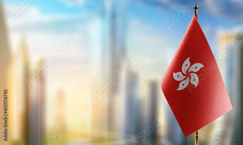 Small flags of the Hong Kong on an abstract blurry background