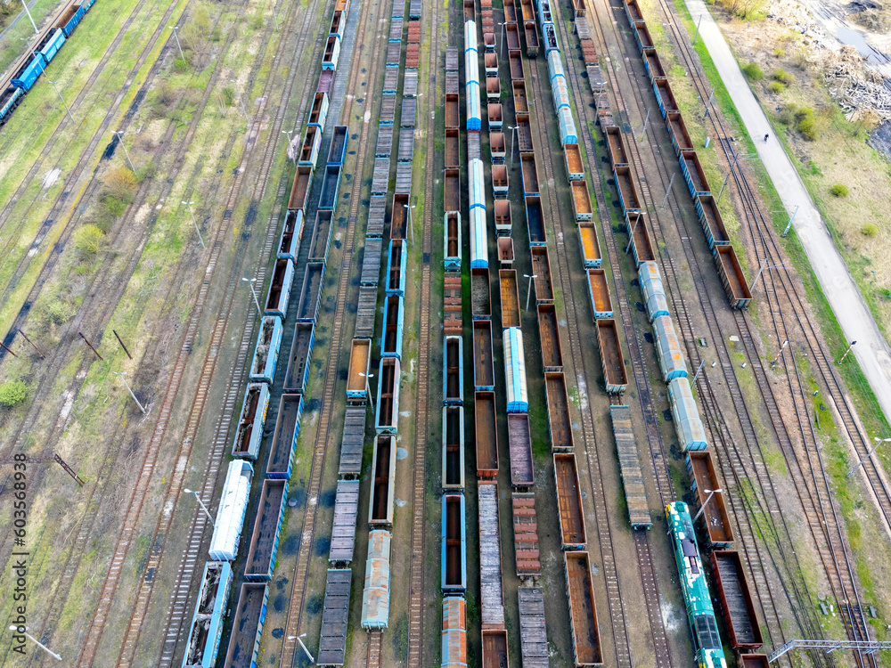 Aerial view landscape. View of trains, cars, cargo and tracks. Photo from a drone.