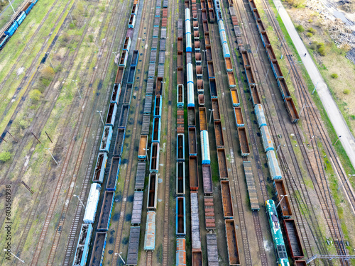 Obraz na płótnie Aerial view landscape. View of trains, cars, cargo and tracks. Photo from a drone. w salonie