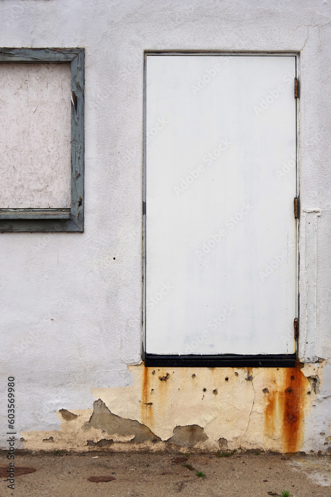Steel back door of an old warehouse Steel back door of an old warehouse