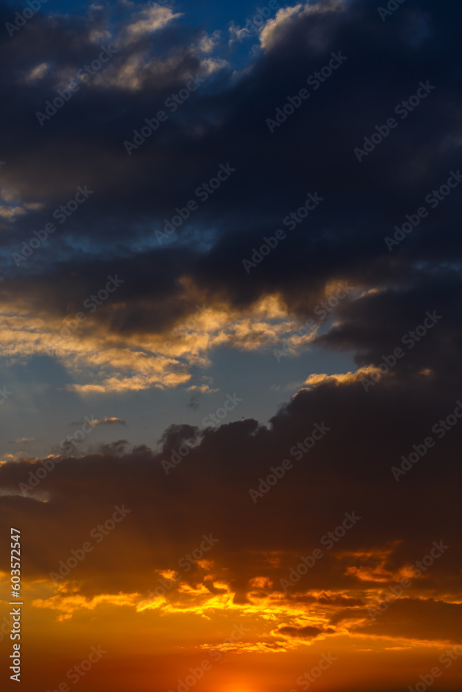 Fototapeta premium sunset sky with dark clouds