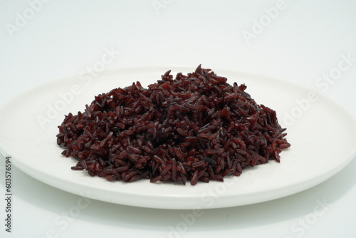 Rice red in bowl isolated on white background / Asian food cooked