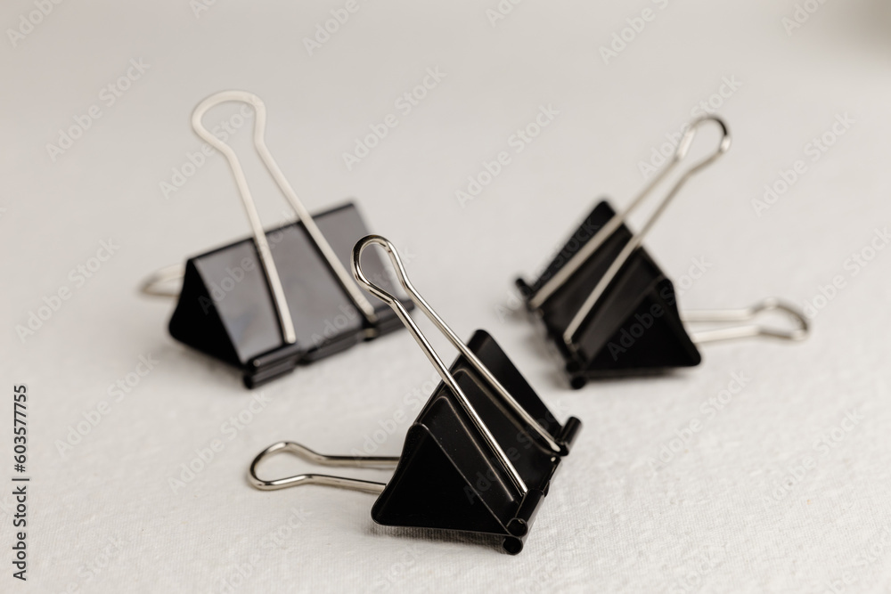 black paper clip isolated on white black paper clip isolated on white