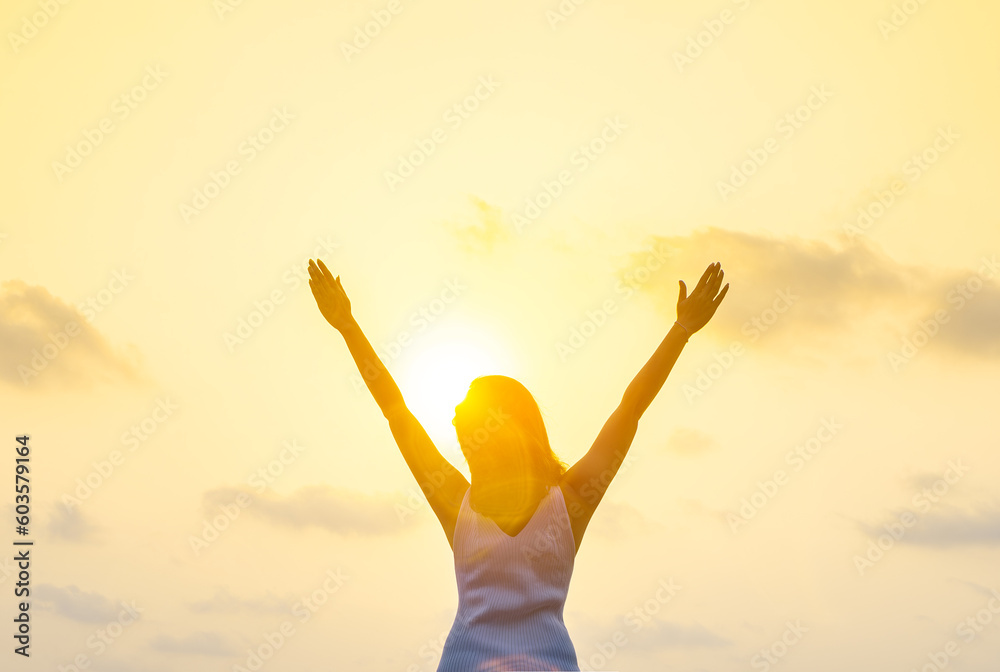 new morning woman lifting arms stretching welcome the morning sun health concept