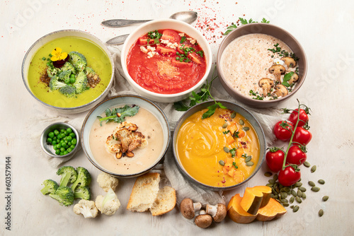 Composition with various soups  ingredients and space for text on white background. Healthy food.