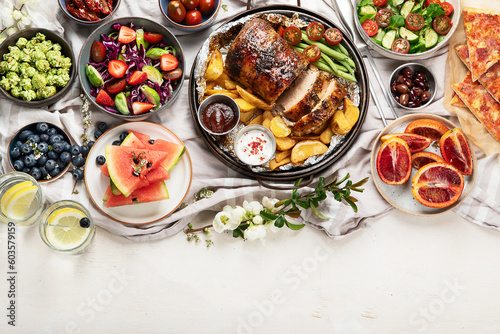 Family dinner or lunch. Many dishes on the table. Top view, copy space
