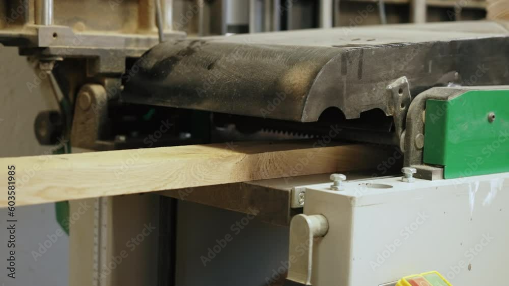 closeup shot of a wooden plank in the vacuum system, working on wood concept. High quality 4k footage closeup shot of a wooden plank in the vacuum system, working on wood concept. High quality 4k footage