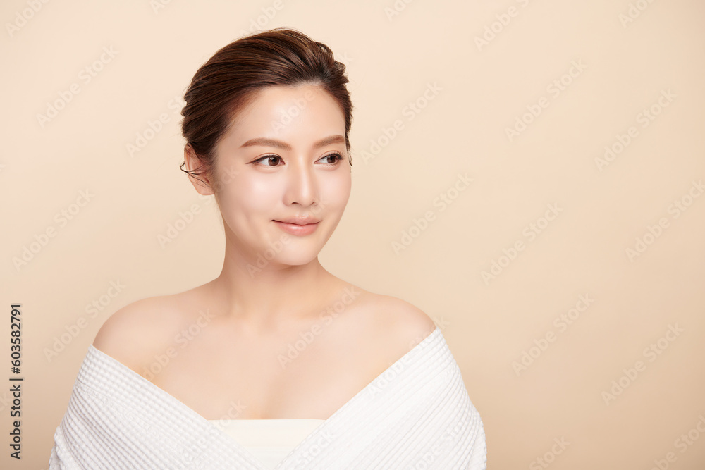 Beautiful young asian woman with clean fresh skin on beige background, Face care, Facial treatment, Cosmetology, beauty and spa, Asian women portrait. Beautiful young asian woman with clean fresh skin on beige background, Face care, Facial treatment, Cosmetology, beauty and spa, Asian women portrait.