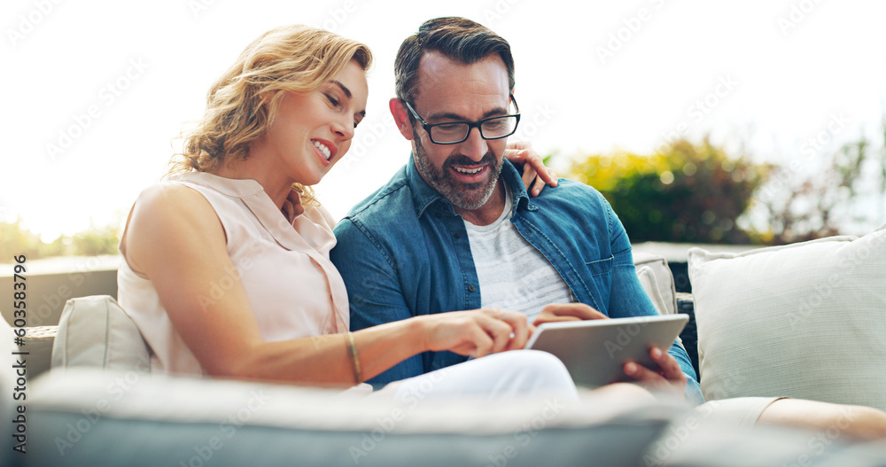 Couple, sofa and tablet for online shopping, streaming or reading, social media communication or ecommerce. Woman, man and relax together on holiday with technology, movie service or network