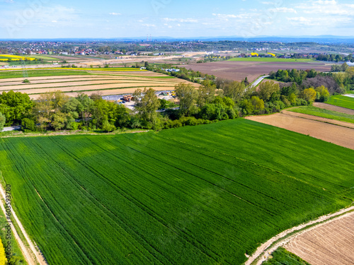 Obraz na płótnie Aerial view landscape. View of fields in the countryside, blue sky, agritourism polish. w salonie