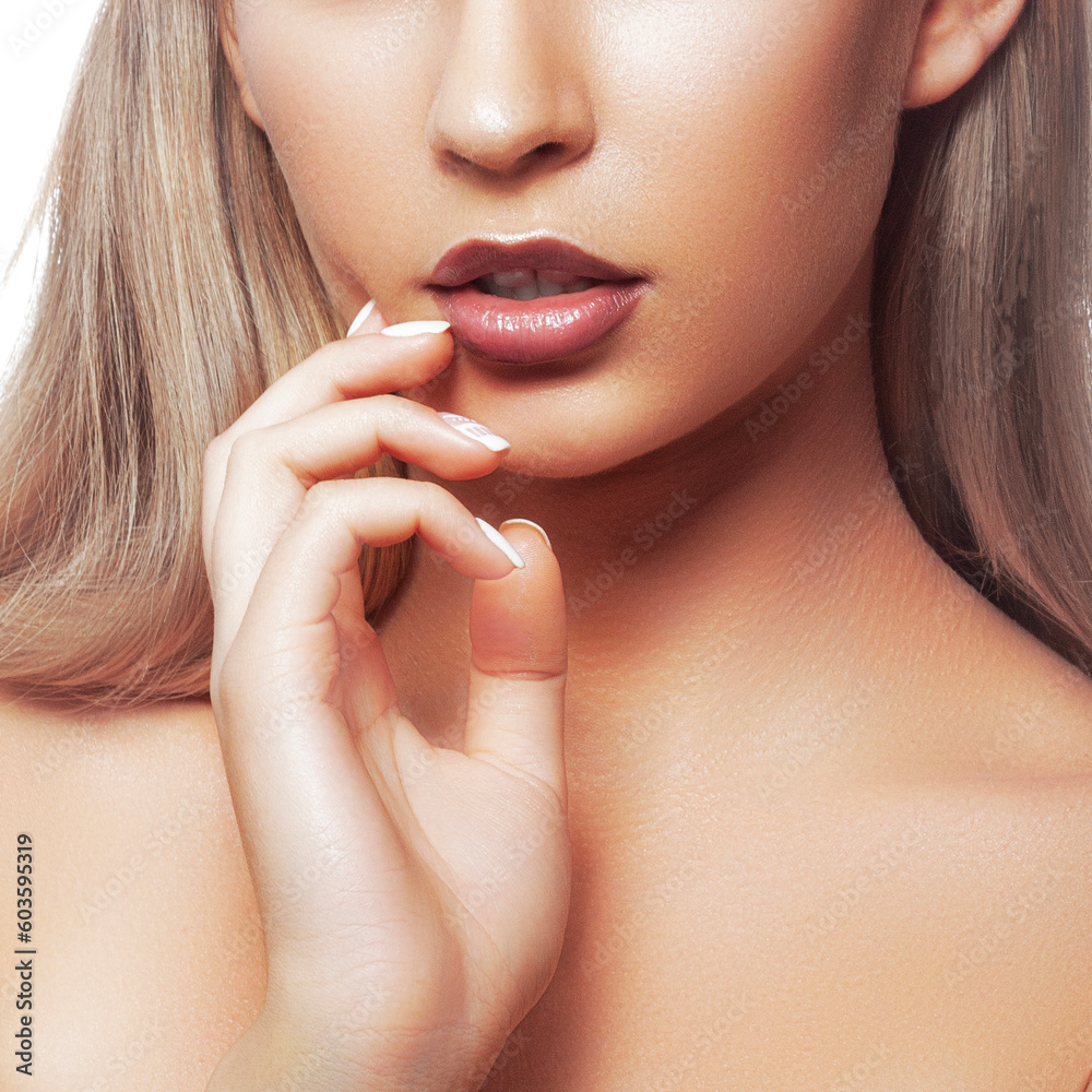 Beauty. Close-uop face of young woman with red lips and makeup