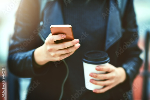 Hands, coffee and phone for texting in city, internet scroll and web browsing. Cellphone, hand and woman networking, online social media and messaging, website and mobile app outdoor on urban street.