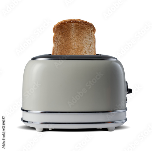 Roasted toast bread popping up of vintage toaster on a white backgroun.