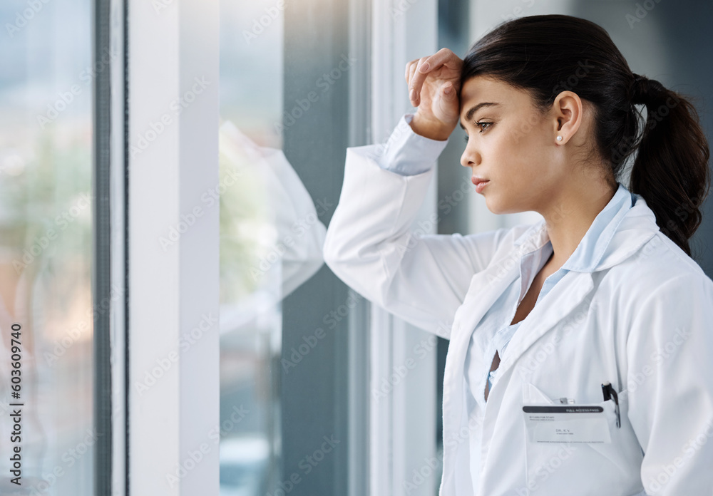 Thinking, stress and doctor by window in hospital with worry, anxiety and tired with headache in clinic. Healthcare, mental health and woman health worker with stressed out, depression and burnout Thinking, stress and doctor by window in hospital with worry, anxiety and tired with headache in clinic. Healthcare, mental health and woman health worker with stressed out, depression and burnout