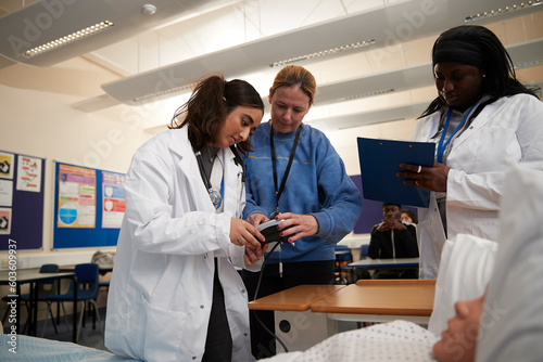 Medical students and teacher in class