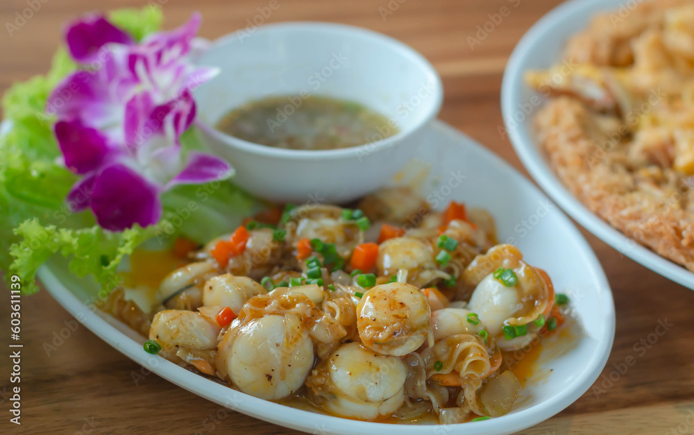 Scallops. Sautéed scallops seared in butter, garlic Scallops. Sautéed scallops seared in butter, garlic