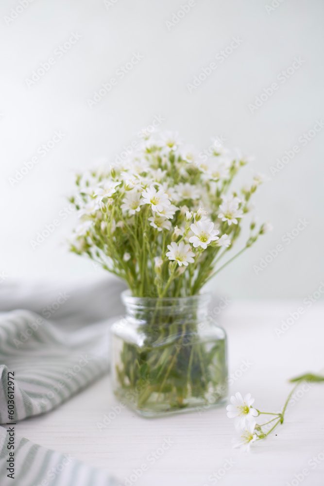 A bouquet of wild forest flowers in a vase A bouquet of wild forest flowers in a vase