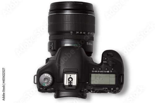photo of used modern black DSLR camera isolated over a transparent background, cutout photography design elements, flat lay / top view with subtle shadow