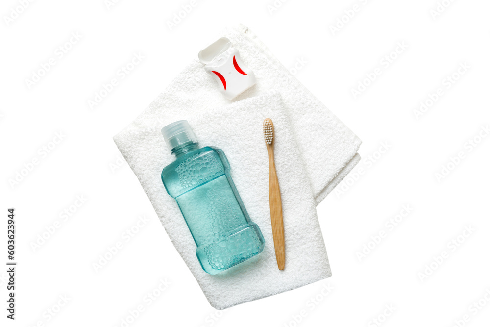 Mouthwash and other oral hygiene products isolated on white background top view with copy space. Flat lay. Dental hygiene. Oral care products and space for text on light background. concept Mouthwash and other oral hygiene products isolated on white background top view with copy space. Flat lay. Dental hygiene. Oral care products and space for text on light background. concept
