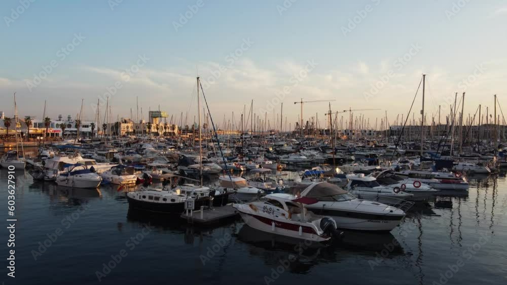 aerial view of beautiful sunset, boats and yachts in port of Alicante, Spain aerial view of beautiful sunset, boats and yachts in port of Alicante, Spain