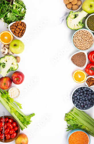 Fototapeta Naklejka Na Ścianę i Meble -  Fresh Ingredients for Dietary, Vegetables, Fruits, Nuts, Meat for Weight Loss on White Background