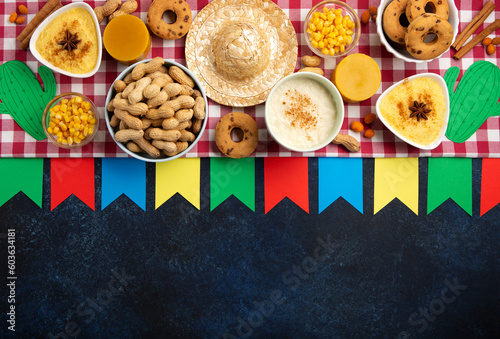 Festa Junina Summer Festival Carnival concept. Brazilian straw hat, popcorn, peanuts and Corn Cakes on Wooden Background for Brazilian Festa Junina Summer Festival photo