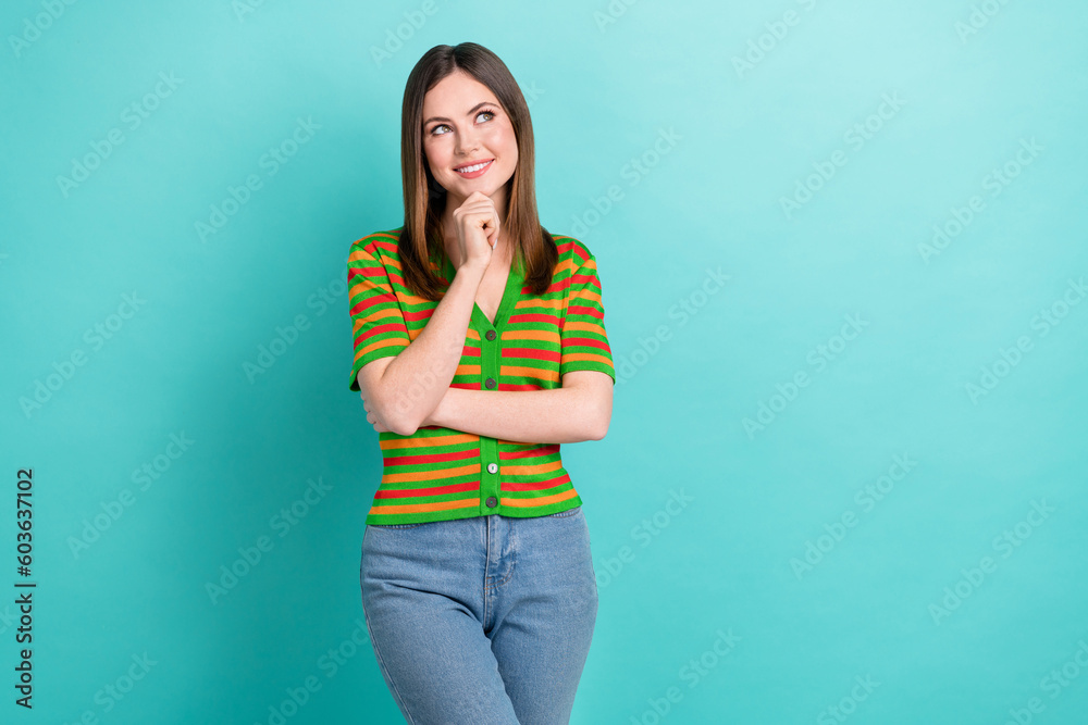 Photo of dreamy sweet lady wear striped cardigan arm chin looking empty space isolated turquoise color background Photo of dreamy sweet lady wear striped cardigan arm chin looking empty space isolated turquoise color background
