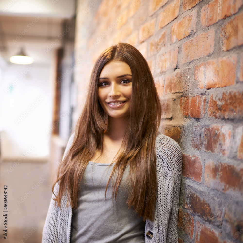 University, education and portrait of happy woman at college ready to study, class and learning. Scholarship, knowledge and face of female student leaning on wall at school, academy and campus University, education and portrait of happy woman at college ready to study, class and learning. Scholarship, knowledge and face of female student leaning on wall at school, academy and campus