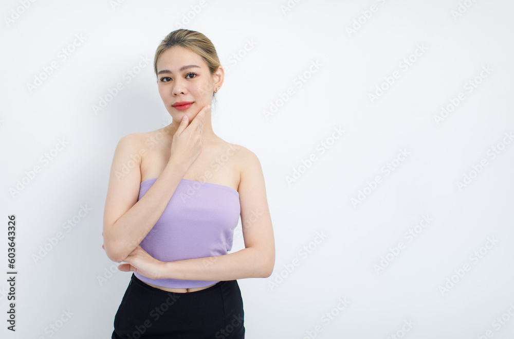 Portrait isolated cutout closeup shot of millennial Asian young beautiful sexy long hair model in seamless tube cropped top standing posing crossed arms look at camera on white background copy space Portrait isolated cutout closeup shot of millennial Asian young beautiful sexy long hair model in seamless tube cropped top standing posing crossed arms look at camera on white background copy space