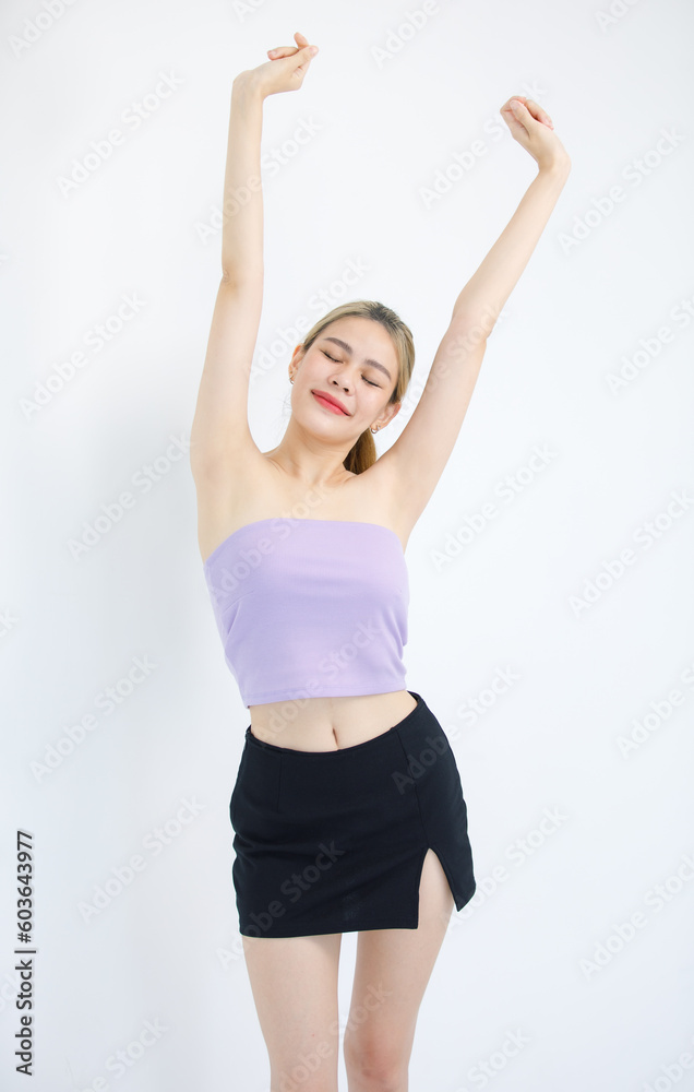 Portrait studio isolated cutout shot of Millennial Asian beautiful pretty cheerful female model in tube cropped top casual shirt holding hands up closed eyes stretching arms on white background Portrait studio isolated cutout shot of Millennial Asian beautiful pretty cheerful female model in tube cropped top casual shirt holding hands up closed eyes stretching arms on white background