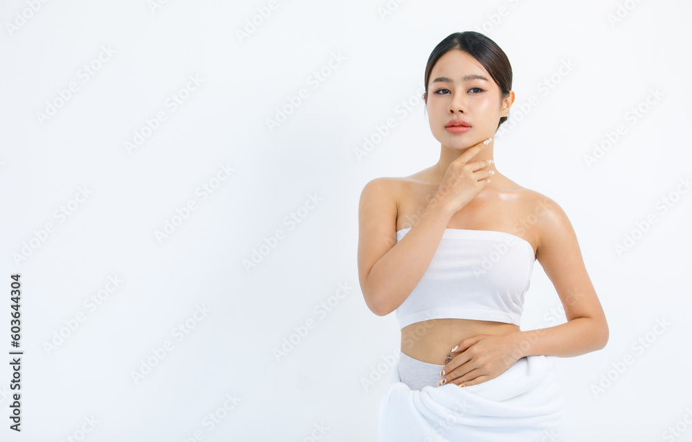 Isolated cutout studio shot millennial Asian beautiful pretty sexy female model in tube cropped top shirt standing smiling holding hand on face showing presenting painting nails on white background Isolated cutout studio shot millennial Asian beautiful pretty sexy female model in tube cropped top shirt standing smiling holding hand on face showing presenting painting nails on white background