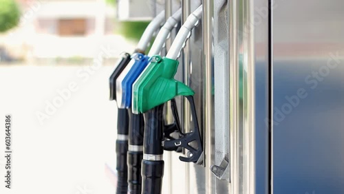 Wallpaper Mural Hand Taking Gasoline Nozzle for Car Refueling at Gas Station. Filling Up the Gas Tank. Gasoline Prices. Close-up of a Man's Hand Using a Fuel Nozzles at a Gas Station.  Gasoline and Diesel Fuel Update Torontodigital.ca