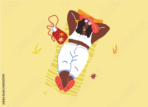 Woman lying on a blanket and enjoying the fresh air and sunshine. Stylized vector character.