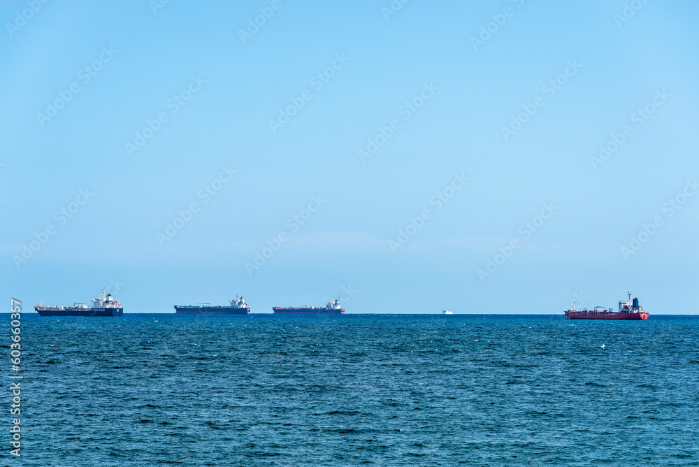 Four tanker ships sailing next of Barcelona, Catalonia, Spain