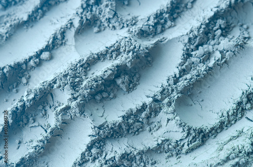 Tableau sur toile Light blue (gray) bentonite facial clay powder (alginate modeling mask, eye shadow, body wrap) texture close up, selective focus