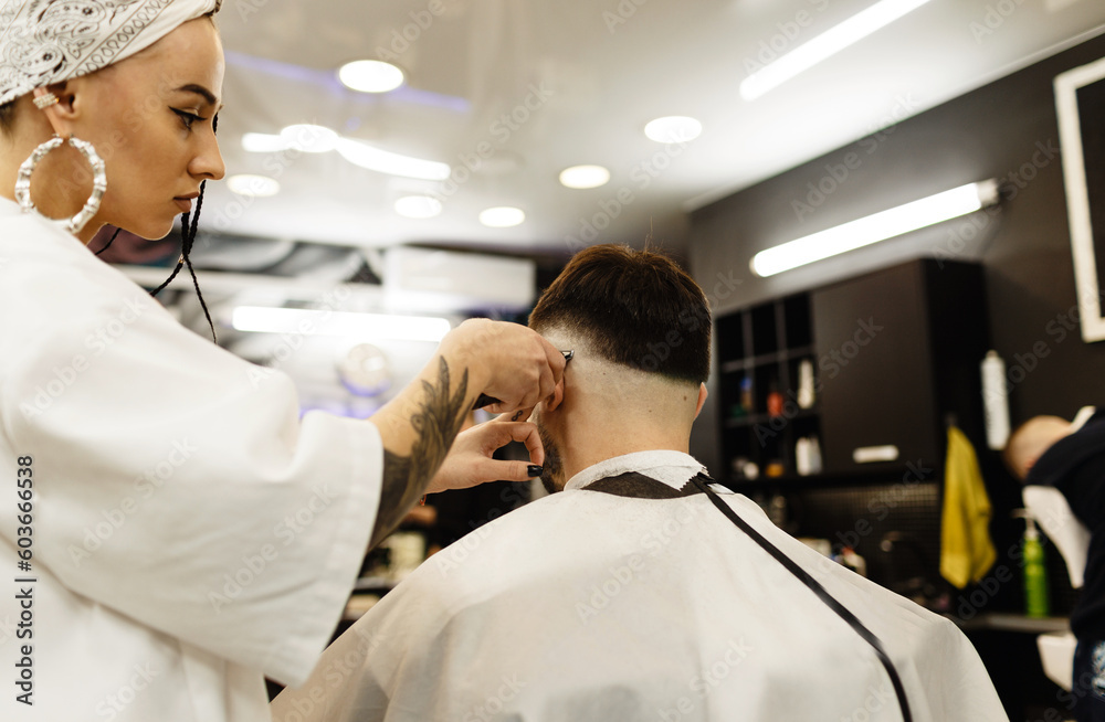 Men's haircut in a barber shop. Men's hair salon. Barbershop Men's haircut in a barber shop. Men's hair salon. Barbershop