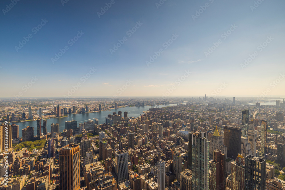 Obraz premium Beautiful aerial view of skyscrapers, against backdrop of landscape of Hudson River in Manhattan. New York, USA.