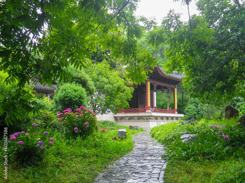 gazebo in the garden around tiger hill on a rainy day