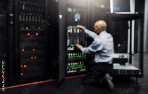 Control room, hardware or technician fixing machine for online cybersecurity glitch or servers system. IT support, data center or blurry engineer working on inspection for information technology