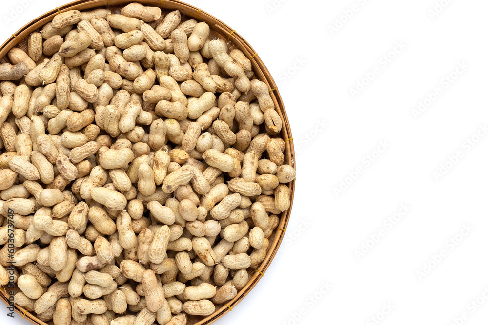 Raw peanuts on white background.