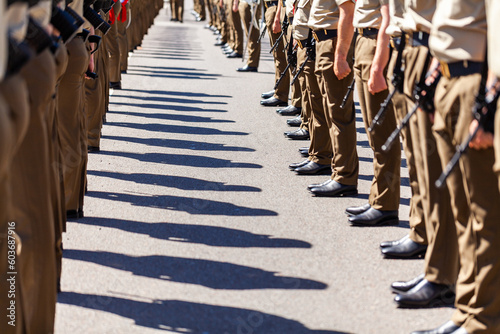 Shadows and boots of australian armed forces at freedom of entry ceremony photo