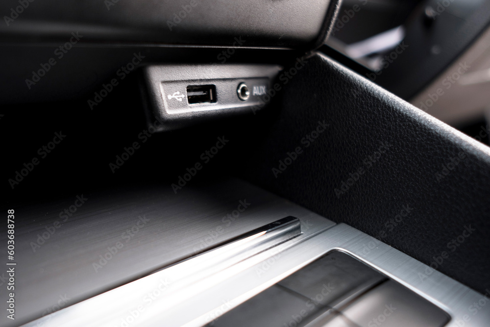 The modern interior of the car is black. Interior details. The modern interior of the car is black. Interior details.