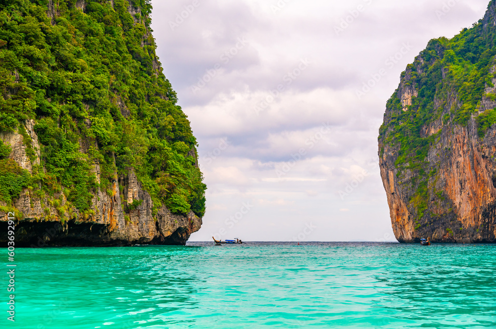 View of famous Maya Bay, Thailand. One of the most popular beach in the world. Ko Phi Phi islands. Beach without people. View of famous Maya Bay, Thailand. One of the most popular beach in the world. Ko Phi Phi islands. Beach without people.