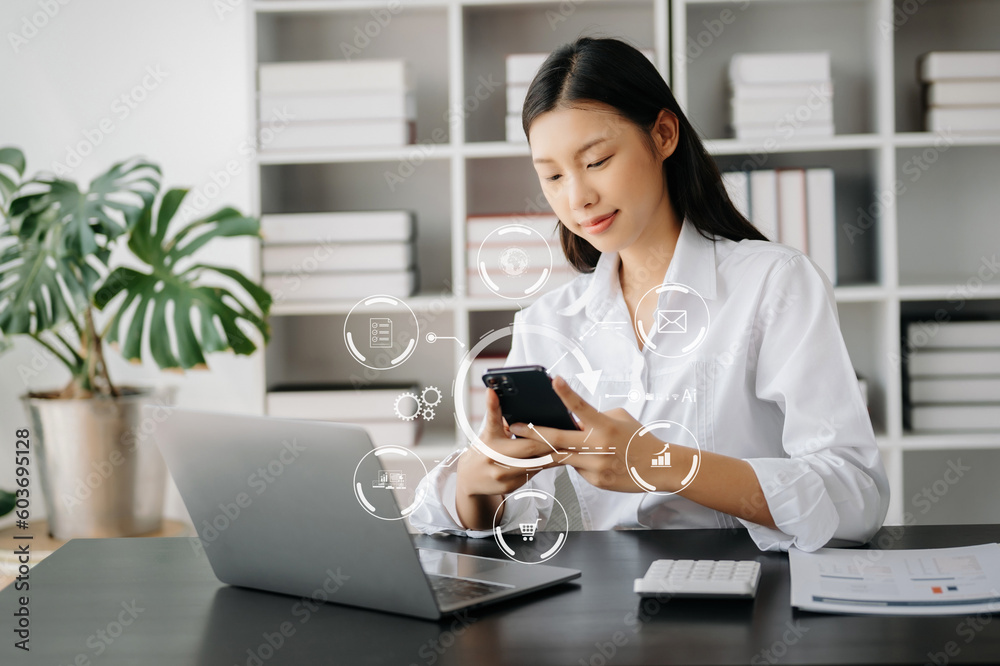 Businesswoman hand working digital marketing media in virtual screen with mobile phone and modern compute with VR icon diagram at office Businesswoman hand working digital marketing media in virtual screen with mobile phone and modern compute with VR icon diagram at office