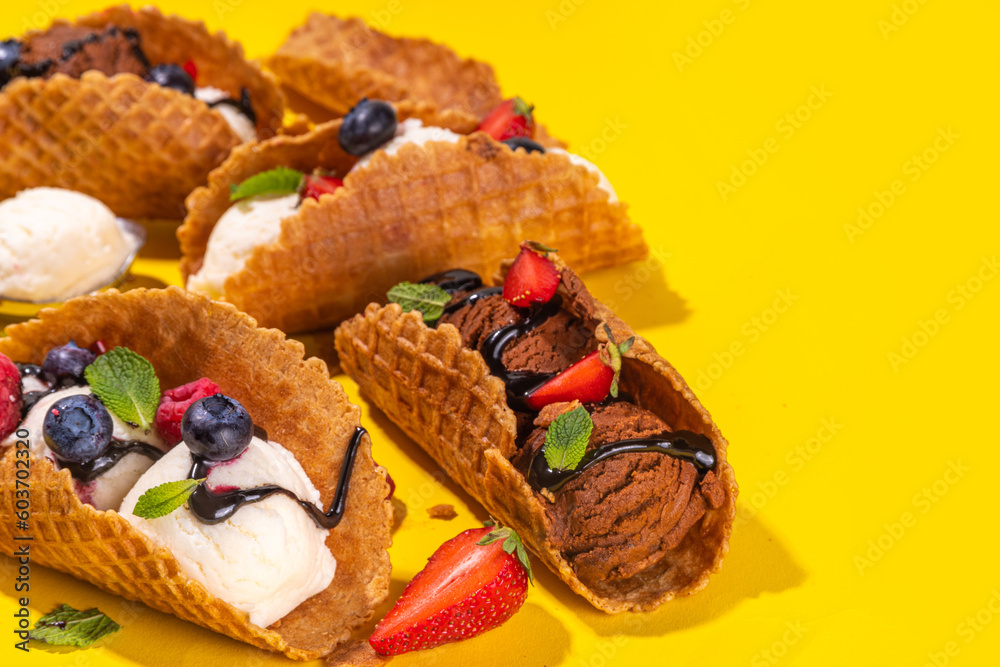 Various sweet taco ice creams. Waffle taco shells with chocolate and vanilla flavour ice cream